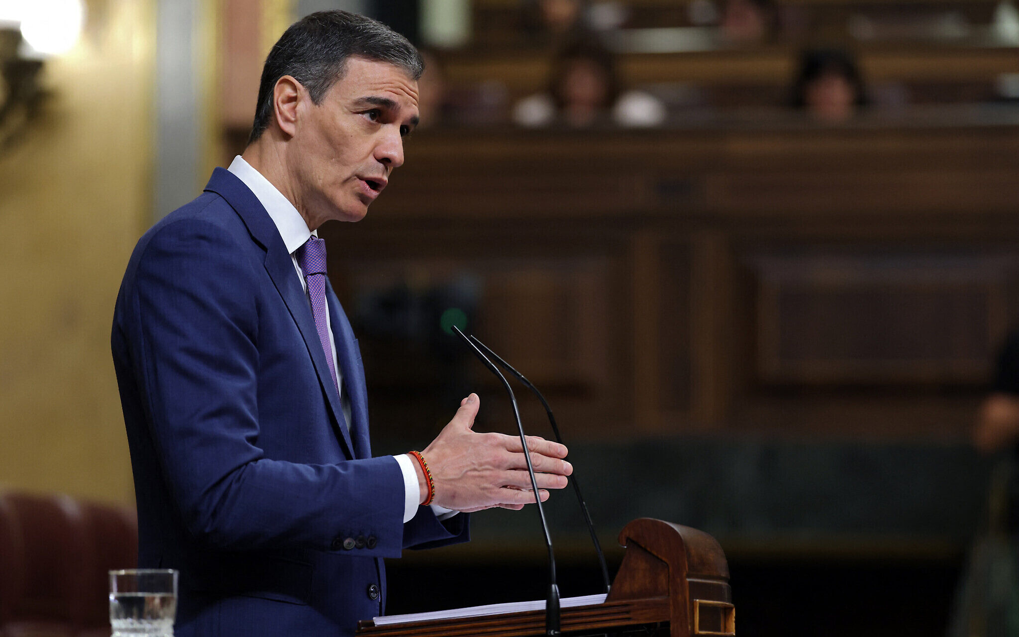 Spanish Prime Minister Pedro Sanchez delivers a speech during a plenary session to discuss, among other things, the April 28 nationwide power outage, which also affected Portugal and parts of southwestern France, at Las Cortes Congress of Deputies in Madrid on May 7, 2025. (Photo by Thomas COEX / AFP)