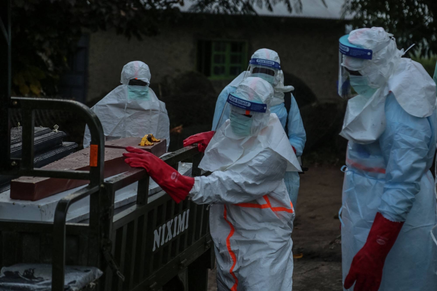 Medical staff wearing personal protective equipment (PPE) prepre to escort the body of a patient deceased at the hospital in Rwampara towards the cemetery on May 21, 2026. According to the WHO, the latest outbreak in the DRC, the 17th to hit the vast central African country of more than 100 million people, is already suspected of having caused 139 deaths out of nearly 600 probable cases.
Many of the cases have been recorded in the epidemic's epicentre in the DRC's northeastern Ituri province, many in hard-to-access areas plagued by the Congolese east's litany of armed groups. (Photo by Seros MUYISA / AFP)